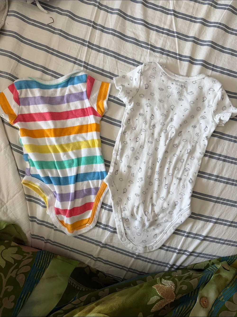 4 Carter's NB Onesies - Rainbow Stripe, blue stripe and White Cloud Prints